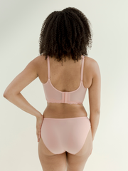 woman wearing seamless bikini style underwear in pink