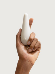 Woman's hand holding Maude vibe personal massager